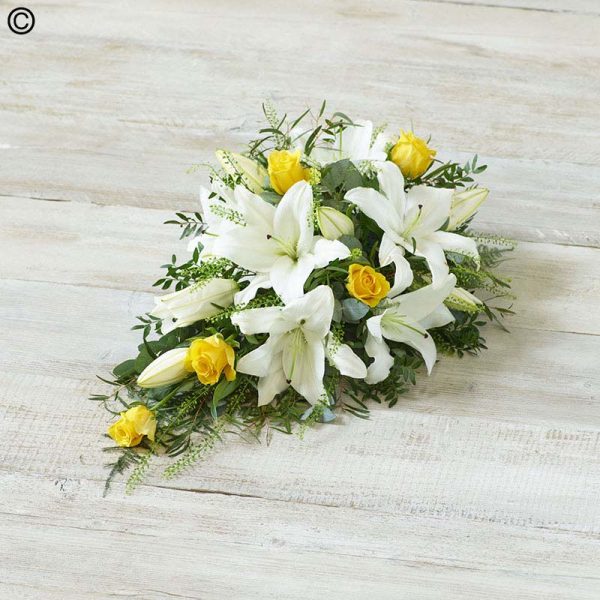 small yellow roses and white lilies