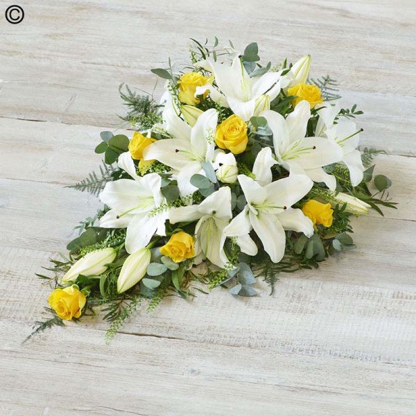 yellow roses and white lilies