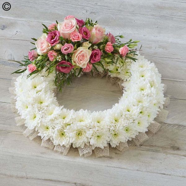 large white and pink wreath